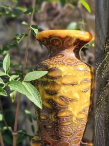 Shimmering gold banksia pod vase